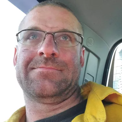 Daniel Jason Kalmbach D.B.A. Top Knot Tree Service