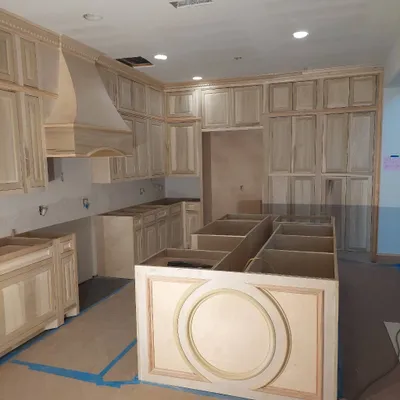 FIRST CLASS CUSTOM CABINETS(trim work,stairs. )