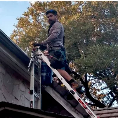 A.T.  Gutters and Construction